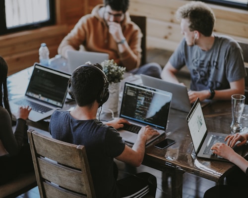 Professional team collaborating in modern office environment